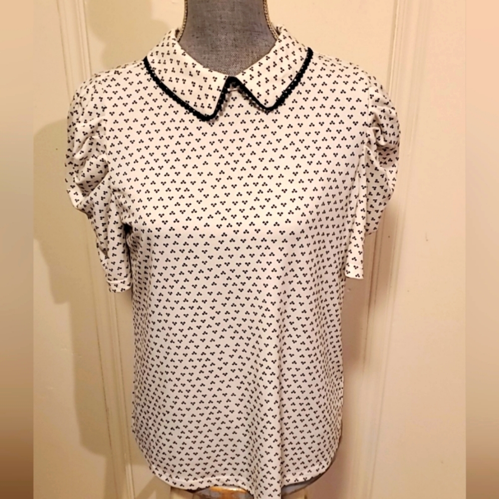 Peter Pan Collared shirt.